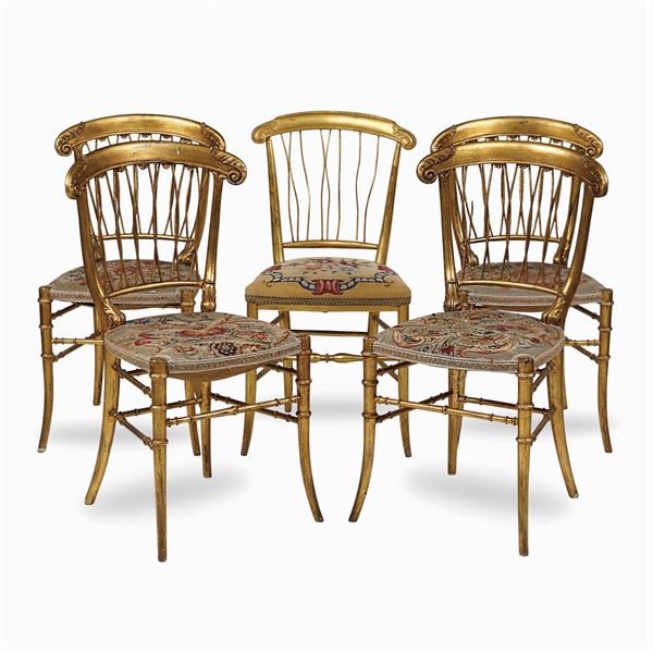 Cinque sedie in legno dorato