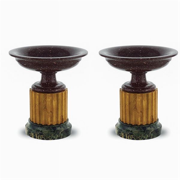 Pair of red porphyry stands