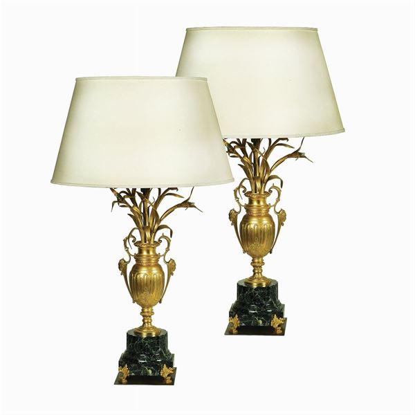 Pair of gilded and chiselled bronze lamps