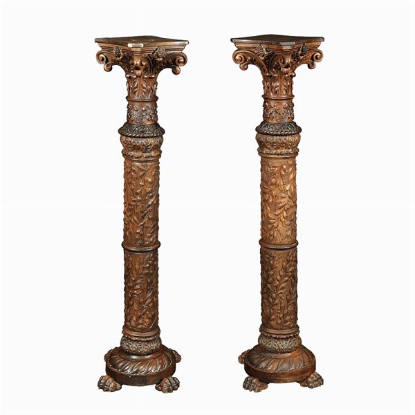 Pair of walnut and inlaid oak columns