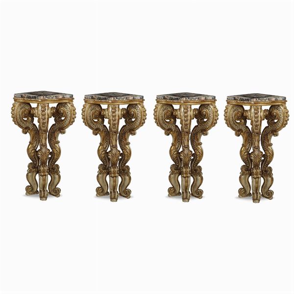 Four lacquered and giltwood corner consolles
