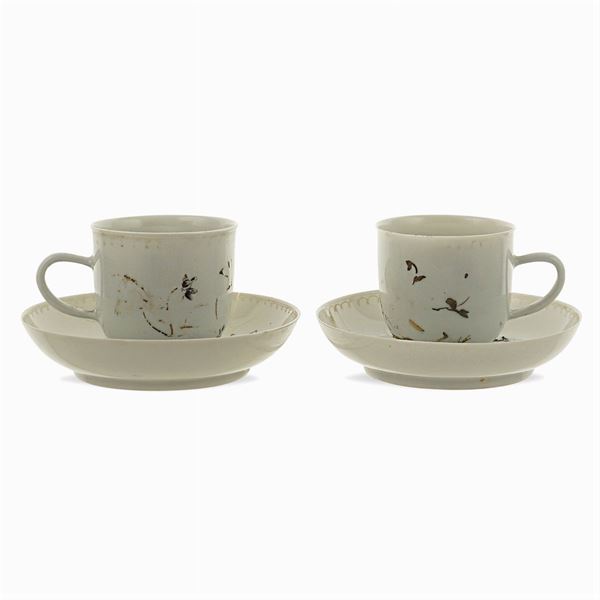 Pair of porcelain cups with saucer