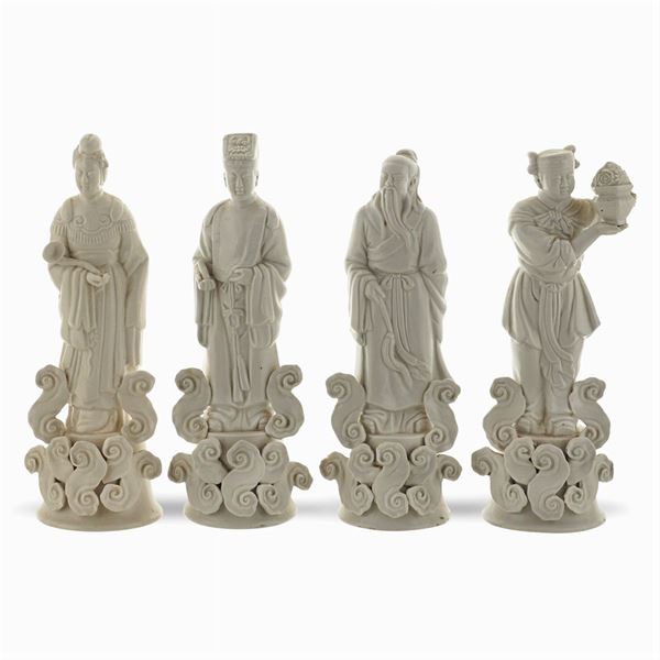 Quattro sculture in porcellana "Blanc de Chine"