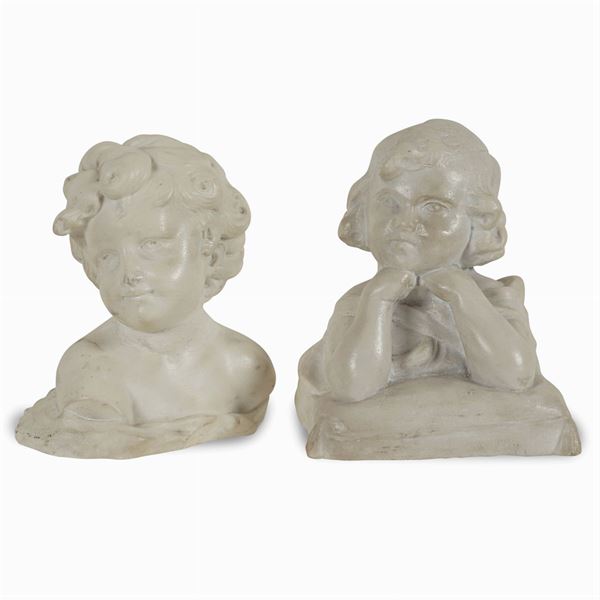 Two white marble portrait busts