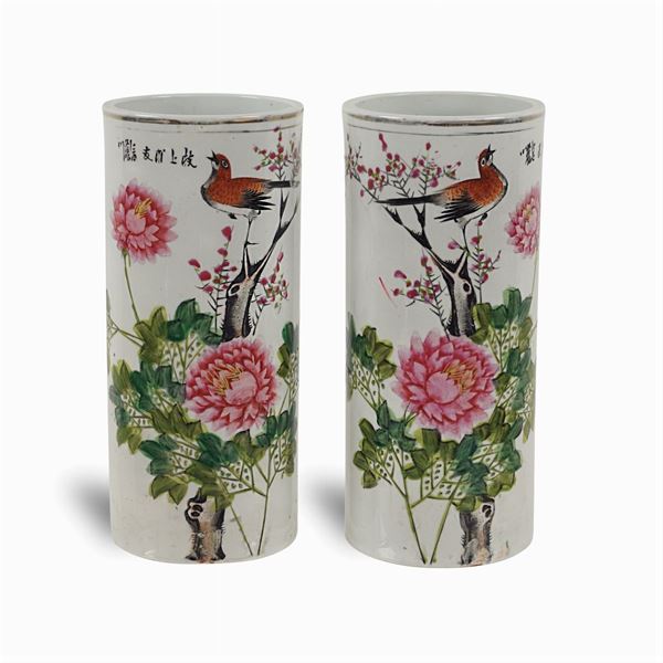 Pair of cylindrical porcelain and polychrome enamel vases