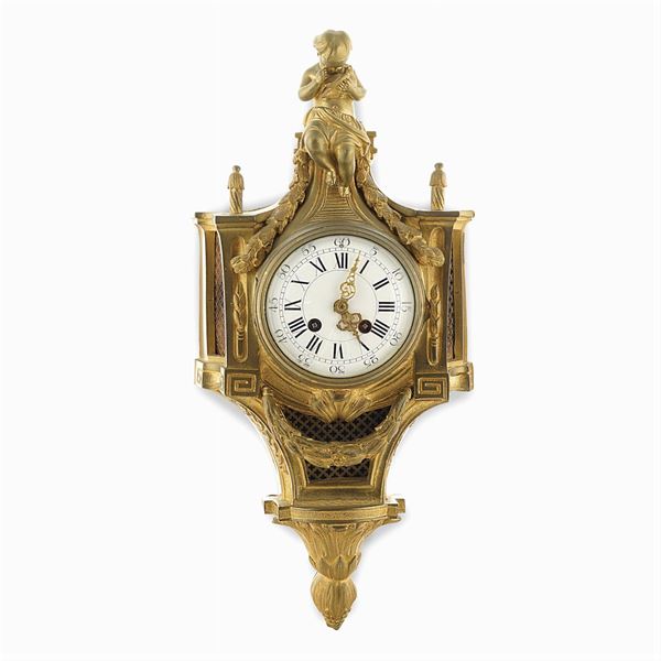 Gilded bronze cartel clock