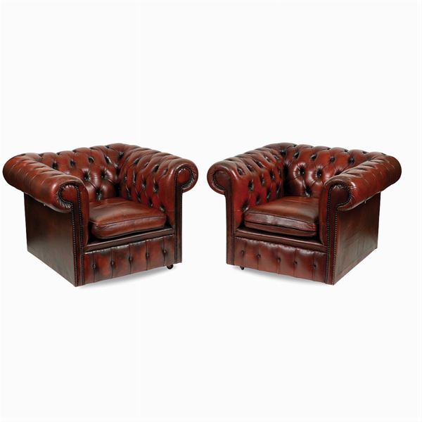 Coppia di poltrone vintage modello Chester capitonné