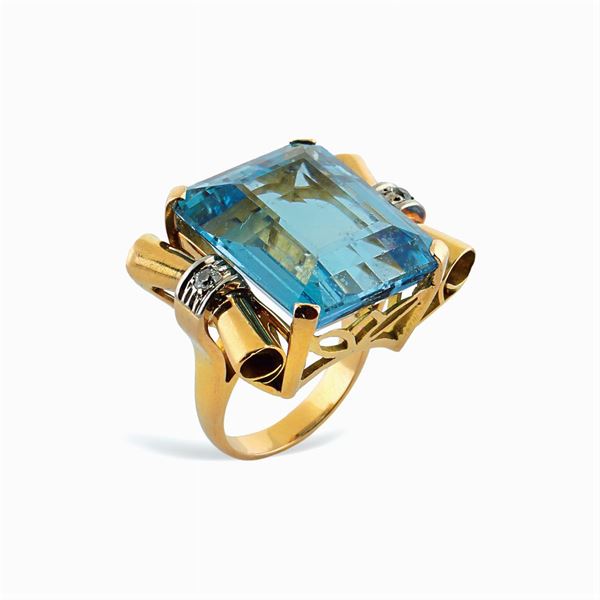 Anello a ponte in oro giallo 18kt con acquamarina