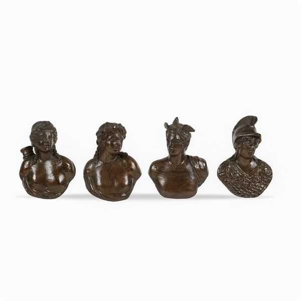 Four burnished bronze portrait busts