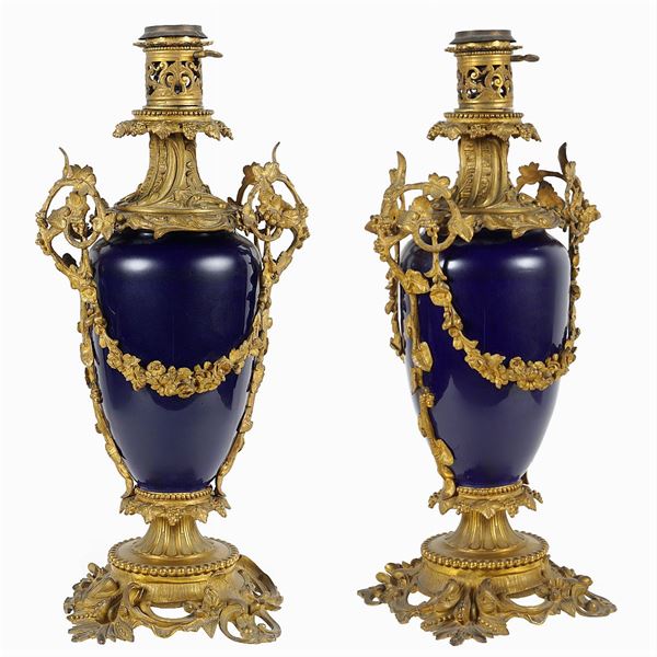 Pair of porcelain and bronze lamps