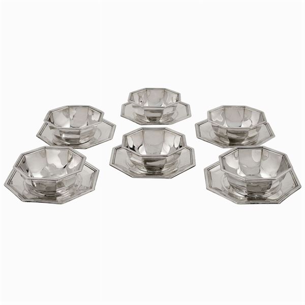 Six cups with saucers