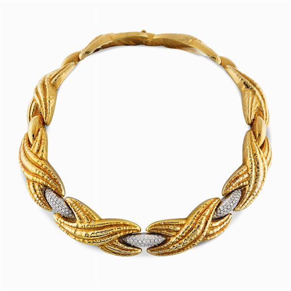 Collier semirigido in oro giallo e bianco 18kt
