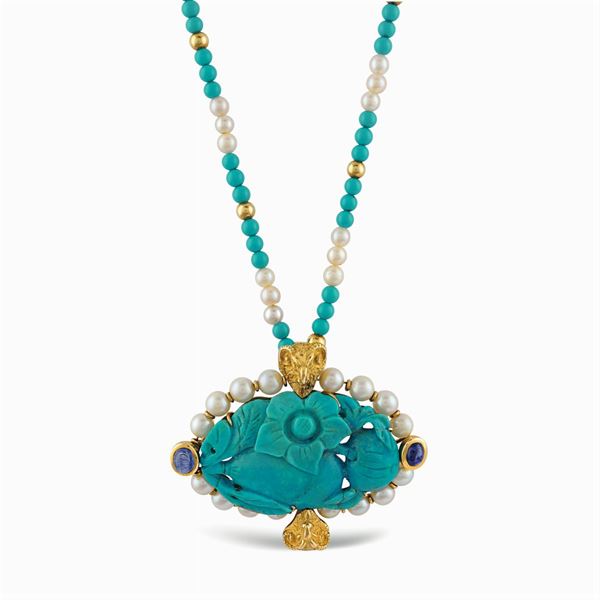 Turquoise pendant brooch sculpted in floral pattern