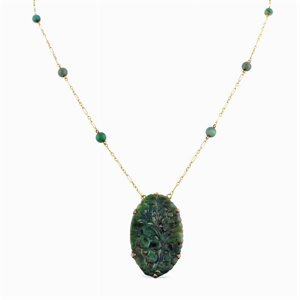 Jade pendant sculpted with floral pattern  - Auction Important Jewels & Fine Watches - Colasanti Casa d'Aste
