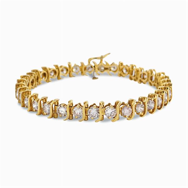 Bracciale tennis in oro giallo 14kt e diamanti