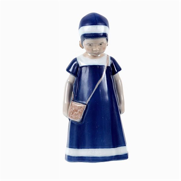 White and blue porcelain figure