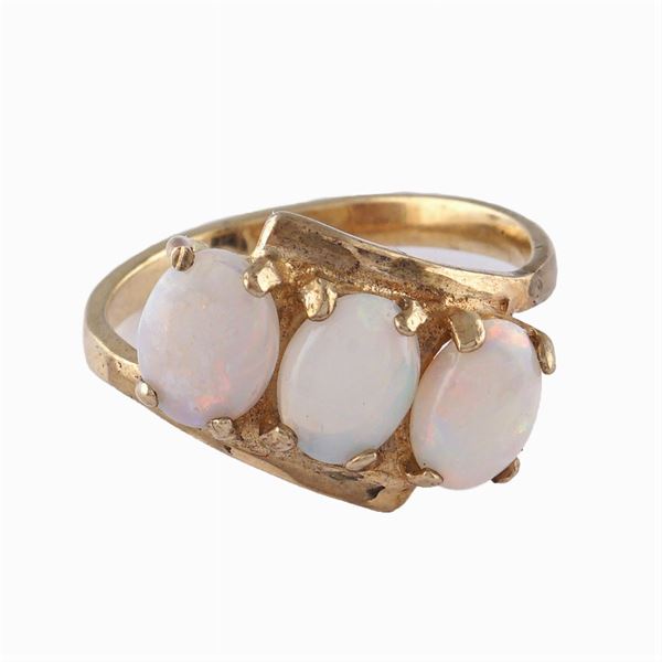 A 14kt gold and three multi-color opals