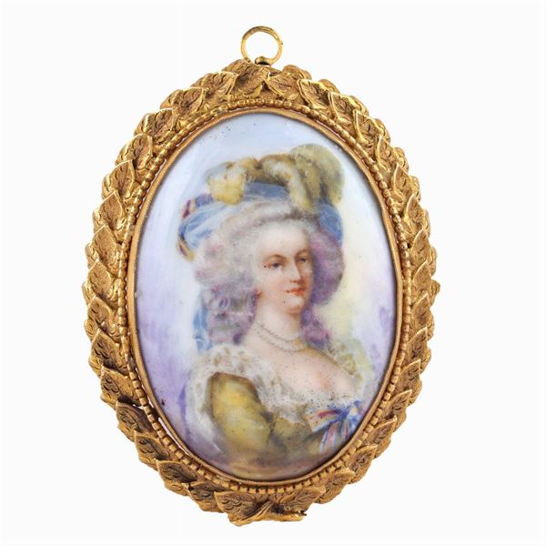 A 14kt gold pendant brooch