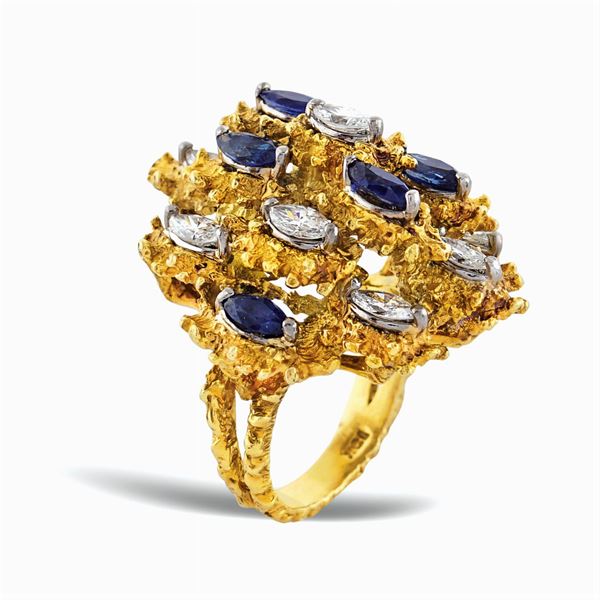Anello scultura in oro giallo 18kt