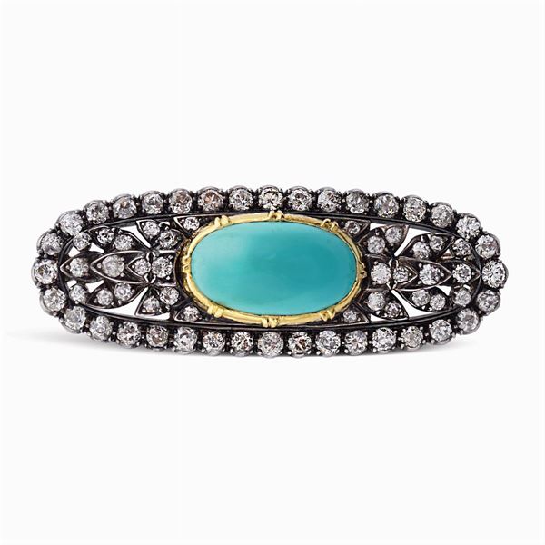 Spilla in oro giallo e argento con turchese naturale