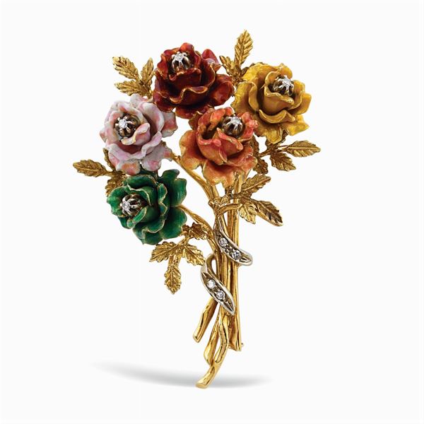 Spilla a motivo floreale in oro giallo 18kt