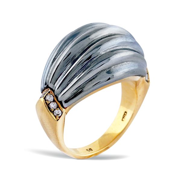 Cartier, anello bombé in oro giallo 18kt ed ematite