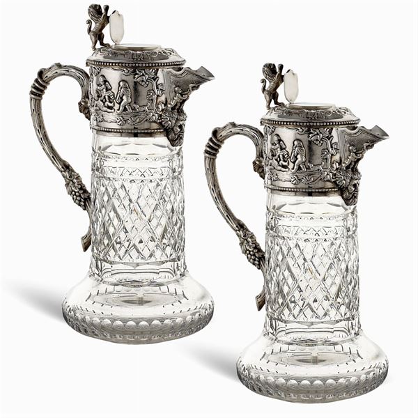 Pair of polished crystal jugs