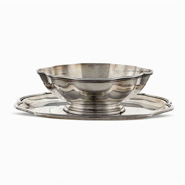 Oval silver sauceboat on stand