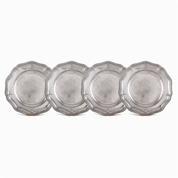 Set of four silver plates