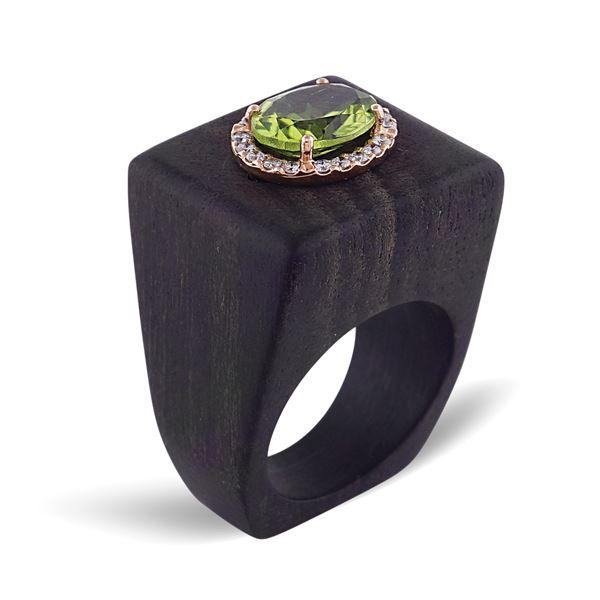 Wood ring with peridot