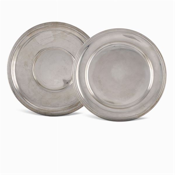 Two circular silver plates
