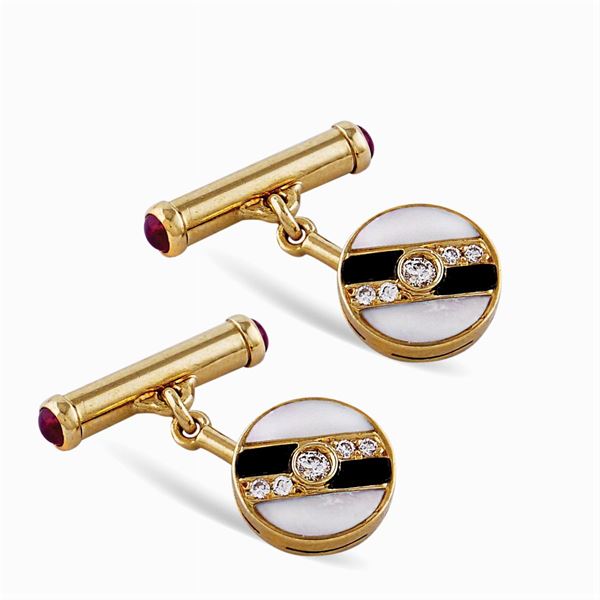 Gemelli circolari in oro giallo 18kt