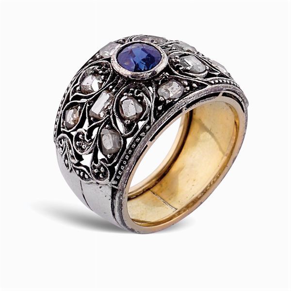 Anello a fascia in argento e oro giallo