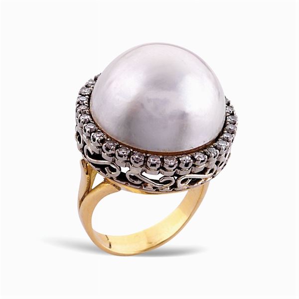 Anello in oro giallo 18kt e argento