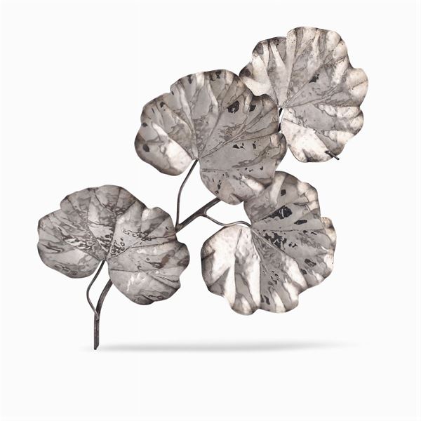 Wrought silver branch of leaves