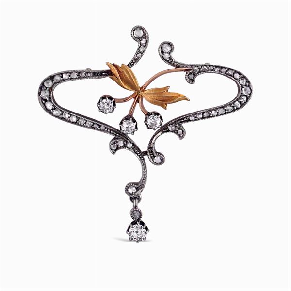 Yellow gold and silver brooch with diamonds