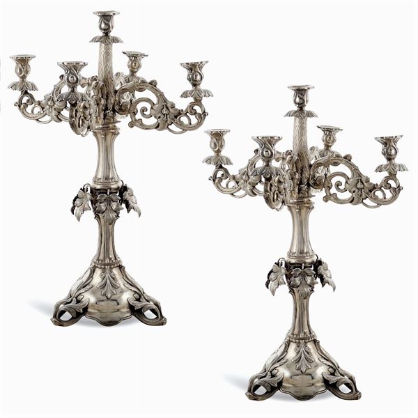Coppia di candelabri a cinque luci in argento