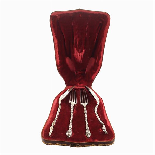 Set of four silver cutlery set