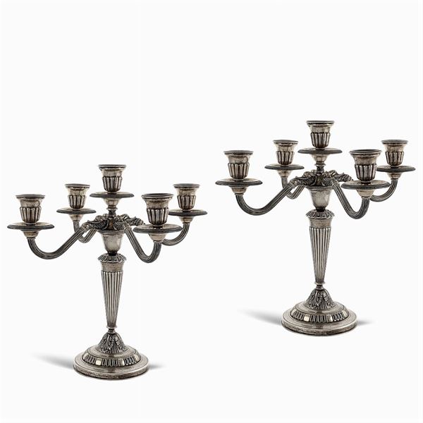 Coppia di candelabri in argento a cinque luci