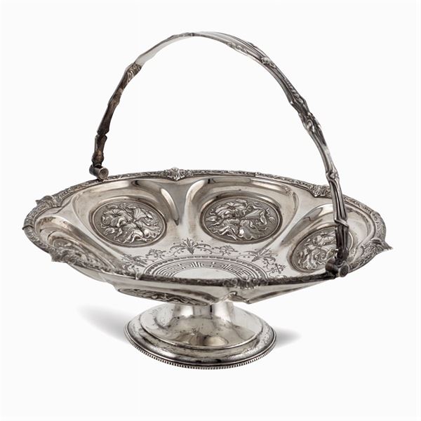 Silvered metal basket with handle