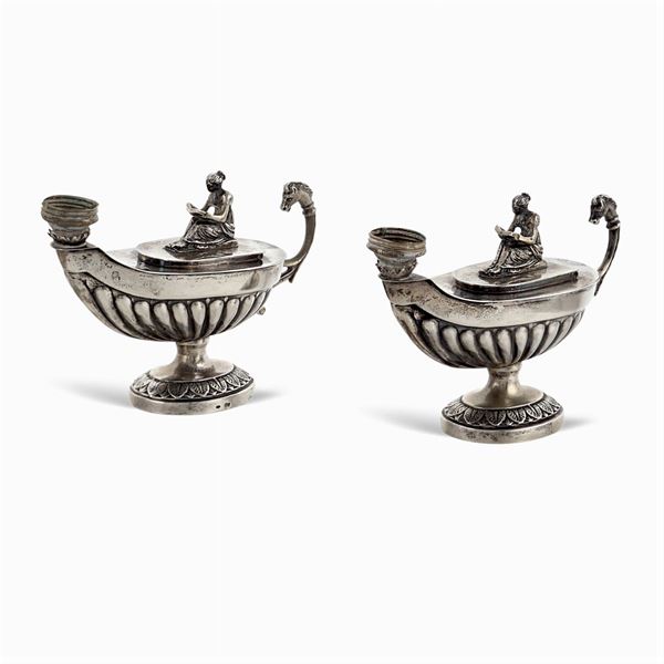 Pair of silver oil lamps