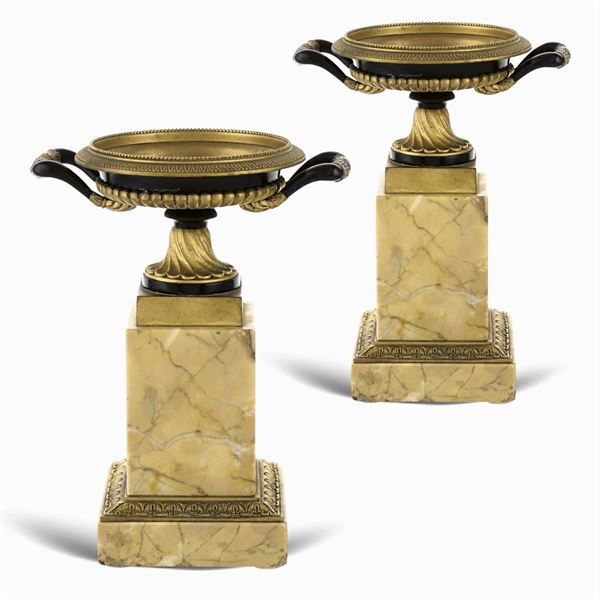 Pair of marble and bronze stands
