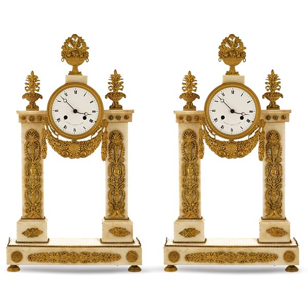 Coppia di orologi da tavolo in stile Neoclassico