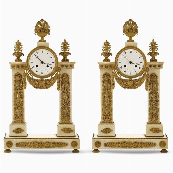Pair of neoclassical style table pendulum clocks