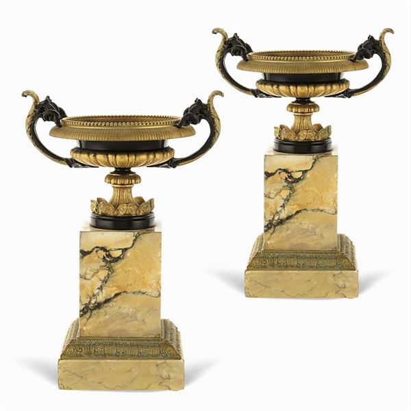 Pair of marble and bronze stands