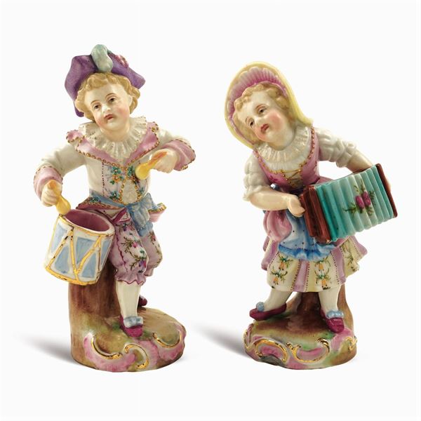 A pair of porcelain figures