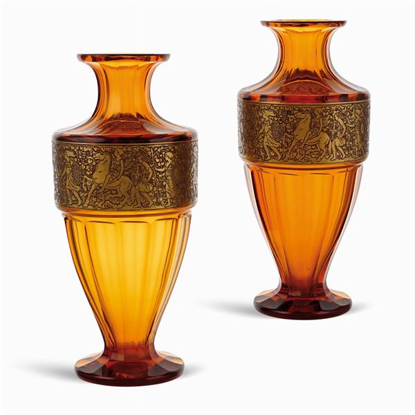 A pair of amber glass vases