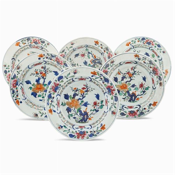 Six porcelain soup plates