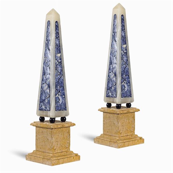 A pair of marble obelisks