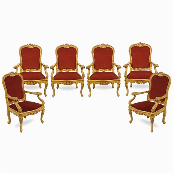 Six varnished wood armchairs